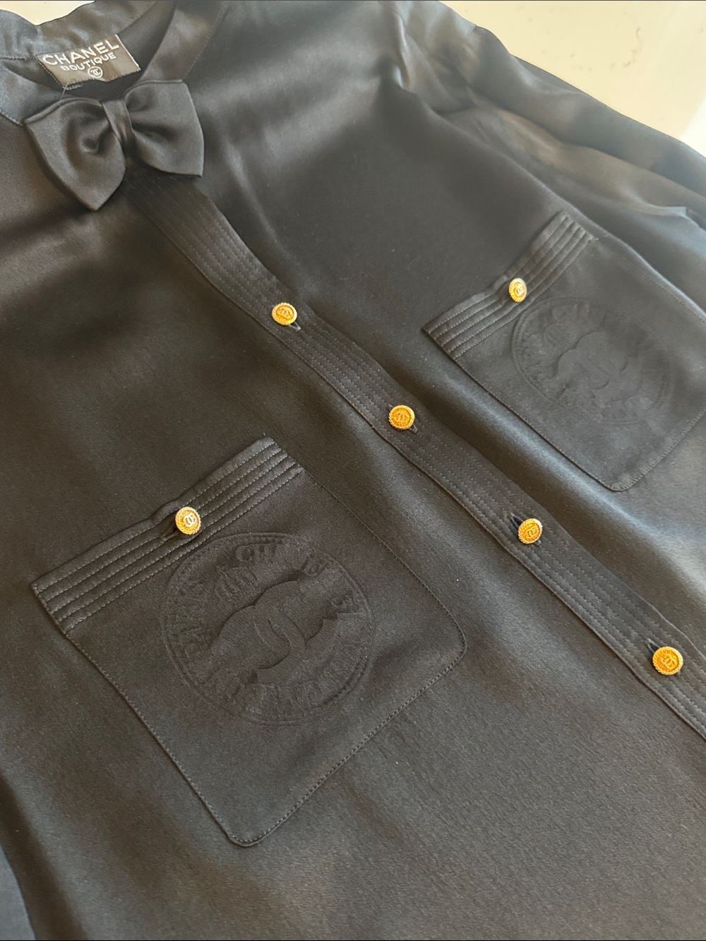 CHANEL Black Silk Bow-Collar Blouse with Gold CC Buttons